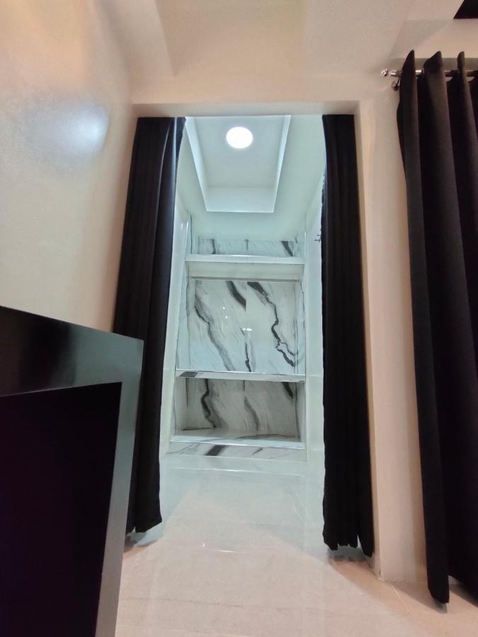 Burgundy Mckinley Place Service Apartment มะนิลา ภายนอก รูปภาพ
