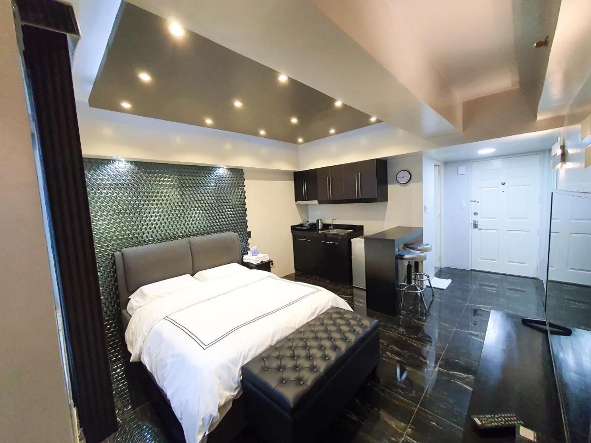 Burgundy Mckinley Place Service Apartment มะนิลา ภายนอก รูปภาพ