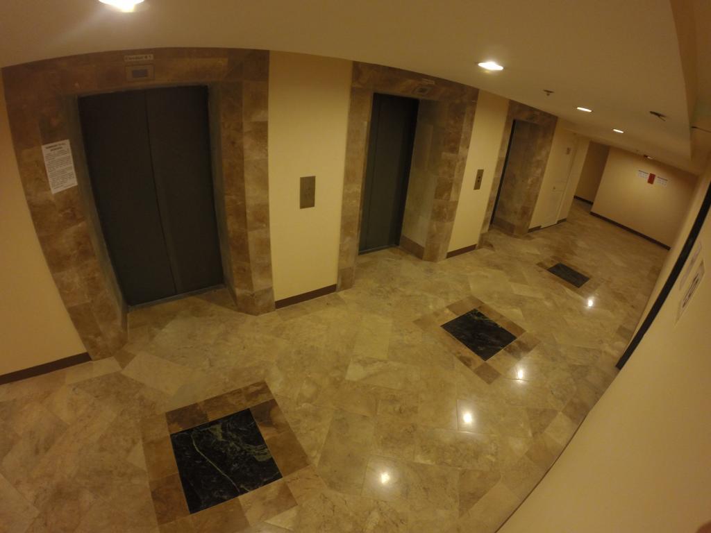 Burgundy Mckinley Place Service Apartment มะนิลา ภายนอก รูปภาพ